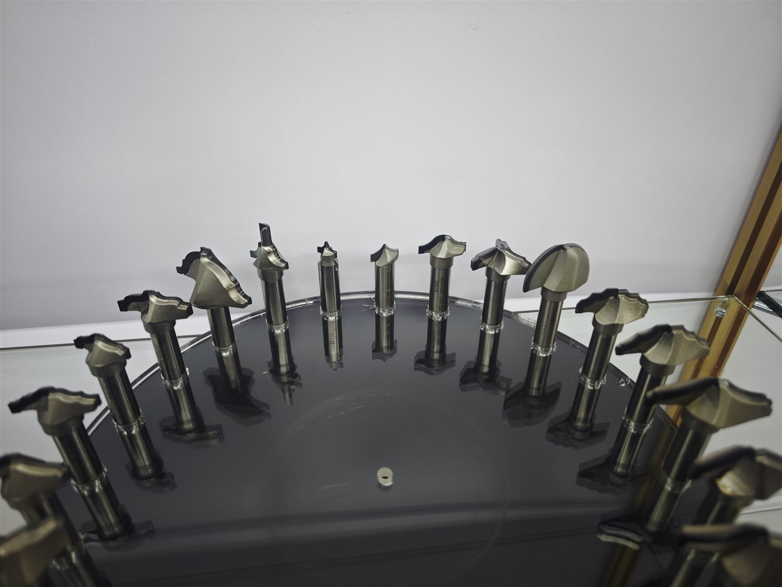 Custom profile router bits displayed as a product set