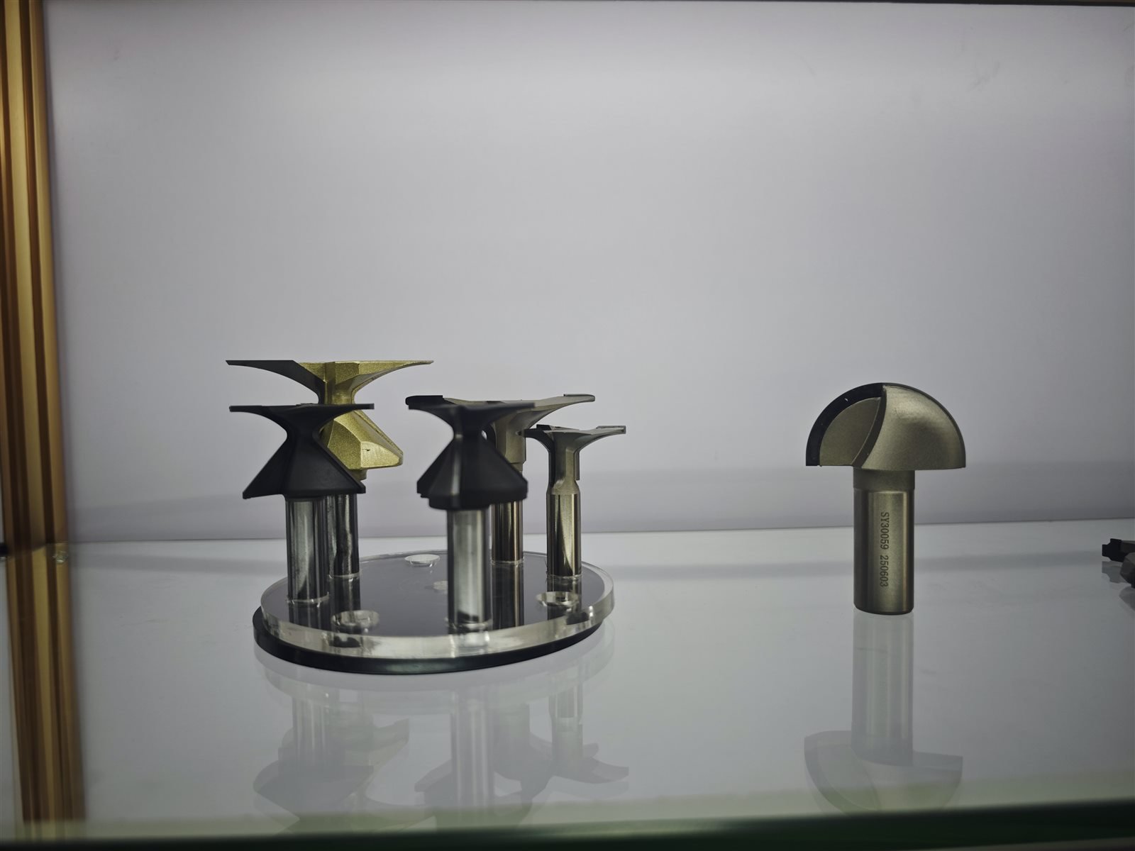 Curved-profile woodworking router bits