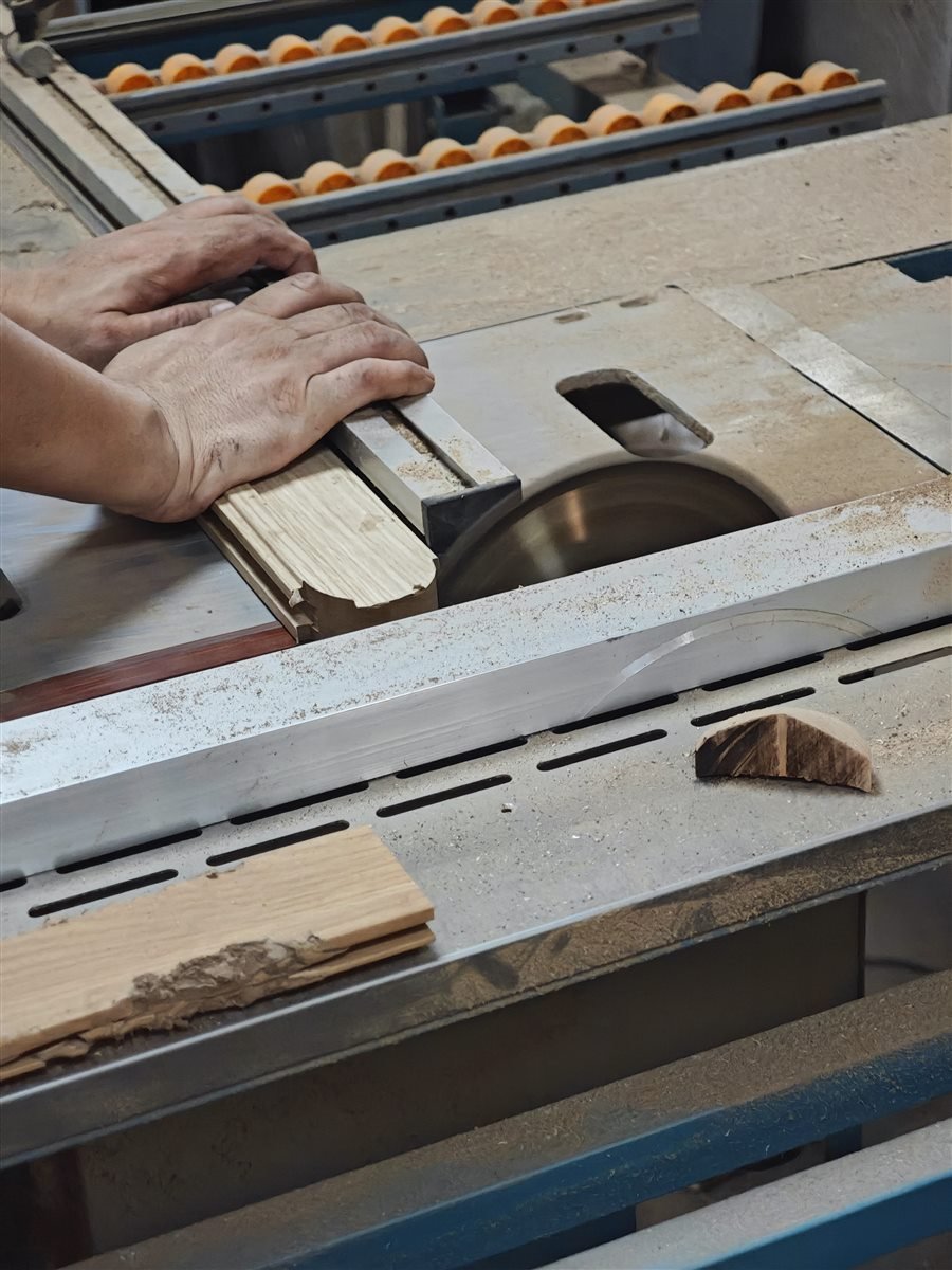 Wood sample being cut to verify a woodworking tool profile